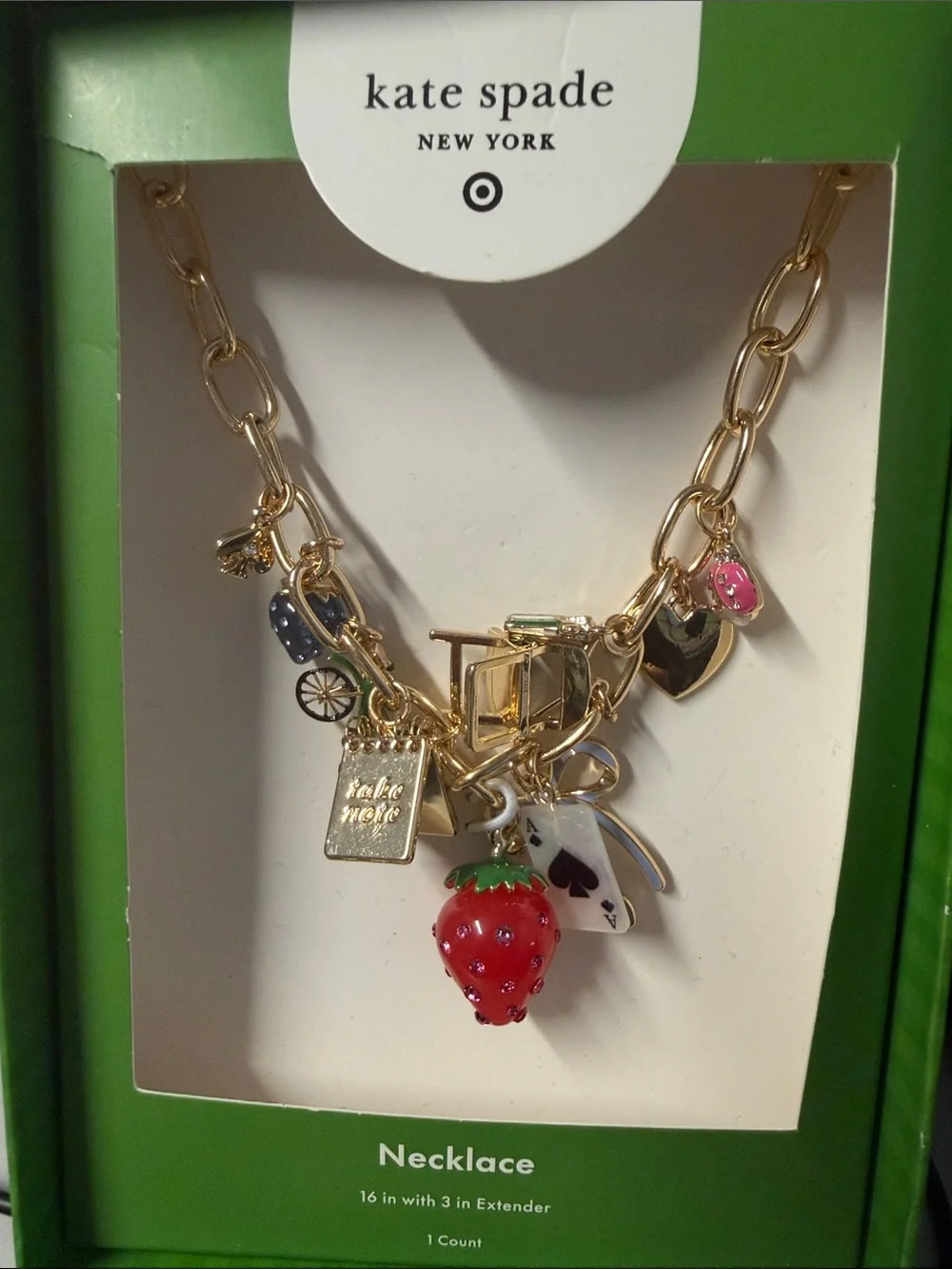 kate spade gold-tone charm necklace with red strawberry and pink accents